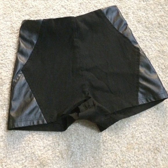 Black shorts with leather finish edging on sides