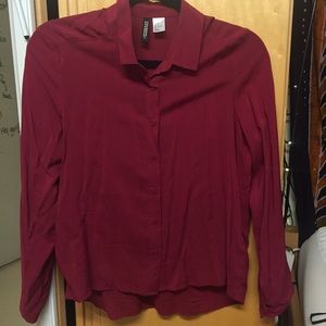 maroon button up shirt