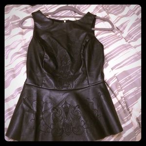 Black embroidered peplum top