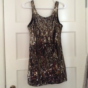 Brand new with tags gold and black mini dress