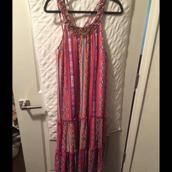 Beach dress with embellishments on top