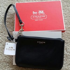 Brand new Coach leather wristlet