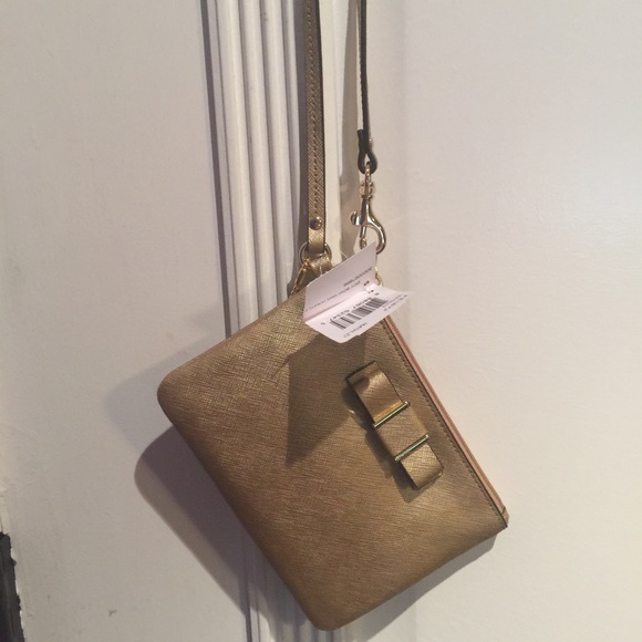 Gold Coach Wristlet Never used.