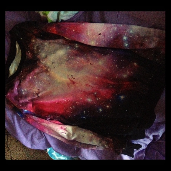 Galaxy themed pullover top.