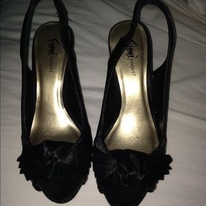 Size six evening pumps