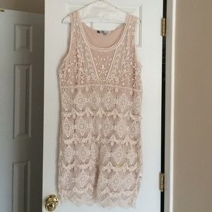 Jennifer Lopez eyelet cream dress