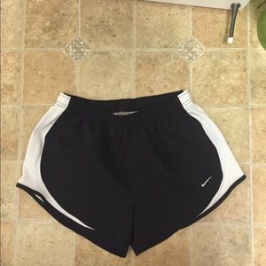 Black Nike running shorts