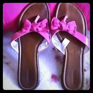 Pink bow flip flops
