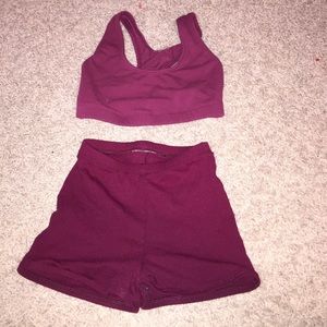 Maroon sports bra and Booty shorts