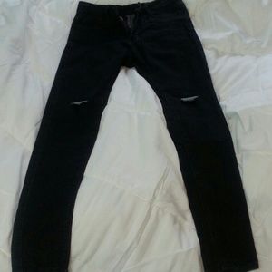 slitted knee black jeans