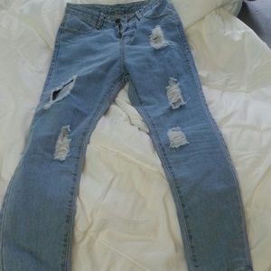 high waisted distressed jeans. Never worn