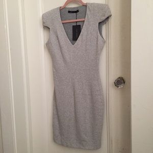 Zara dress. Victoria Beckham / Roland Mouret look.