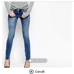 Skinny Mid Rise Acid Wash Jeans
