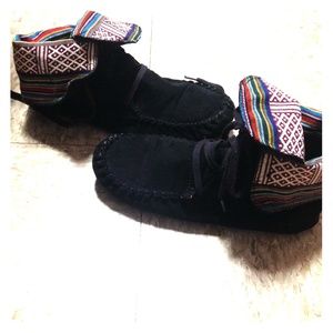 Black moccasin boots