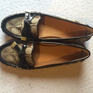 Brown Coach flats.