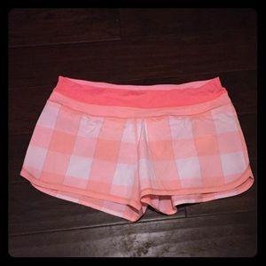 Pink checkered lululemon groove run shorts