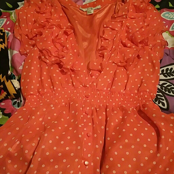 Polka dot ruffle shirt .