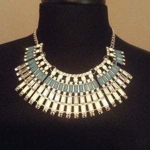 Turquoise, white, and diamond necklace.