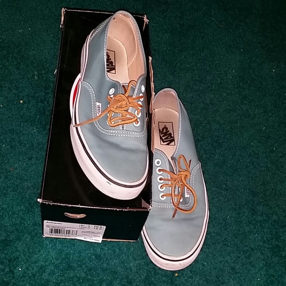 Baby blue/teal vans