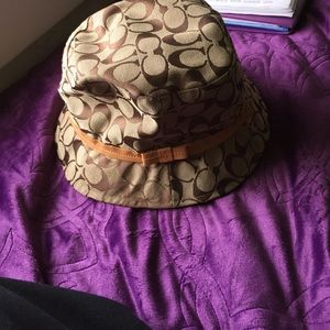 Burberry and Coach bucket hats