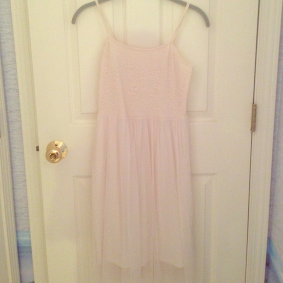 White flowy dress great for spring and summer.