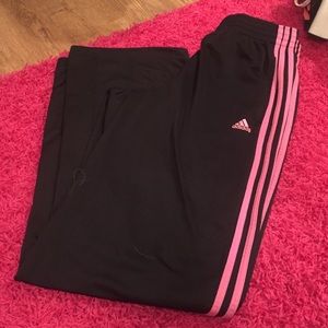 Black and pink Adidas sweats