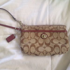 Coach pouch with handle