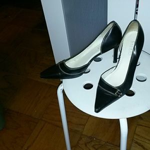 Black leather pumps