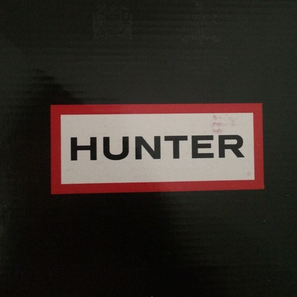 Pink glossy hunter boots