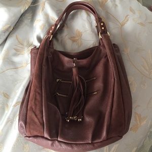 Brown purse with gold hardware