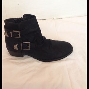 Black zip up booties. NWOT