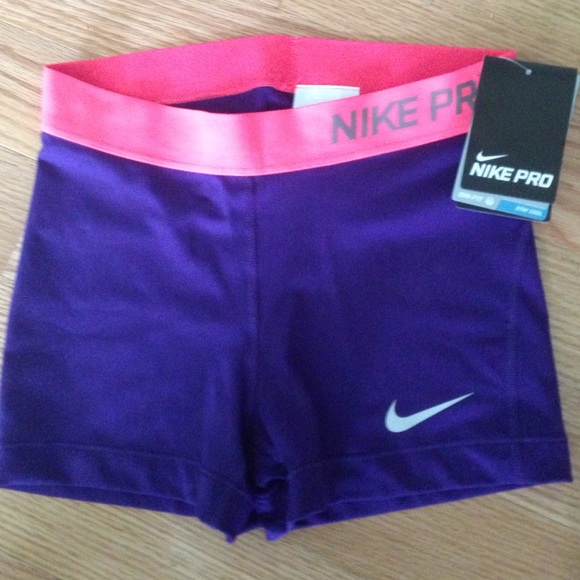 NWT Nike pro spandex puprle neon pink band S