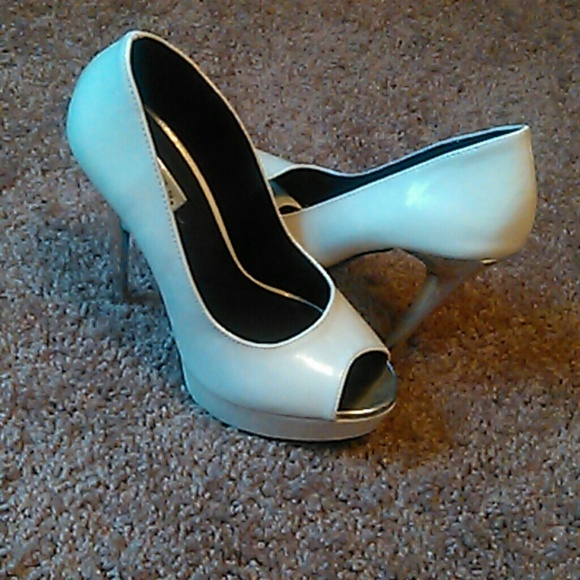 5inch white stilettos w/silver heel.