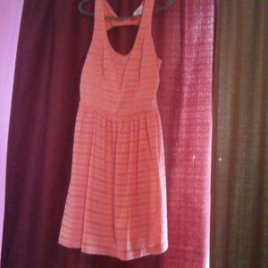 A coral pink dress