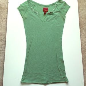 Green shirt with scoop neckline