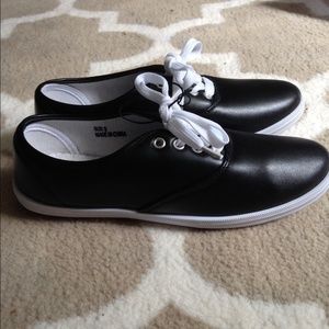 Black faux leather tennis shoes