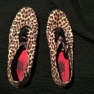 Leopard print vans and white shoes
