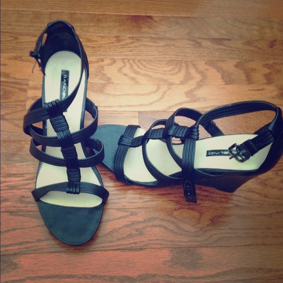 Black leather Bandolino wedges.