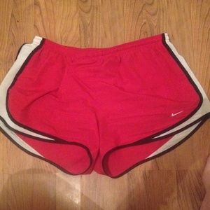 Red Nike shorts