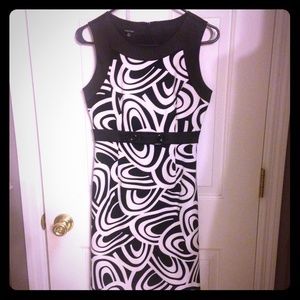 Sleeveless black & white dress.