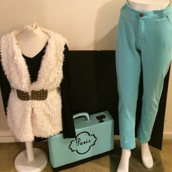 Cream colored faux fur vest..