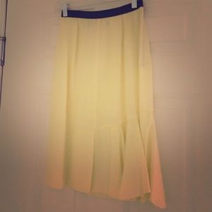 Pale yellow with black trim waist skirt.