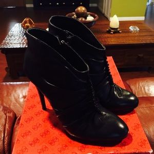 Black ankle boots by Guess.