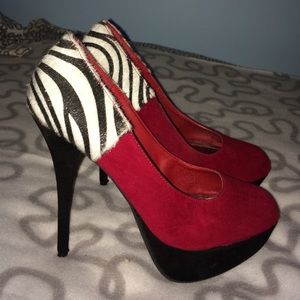 Red suede and zebra heels