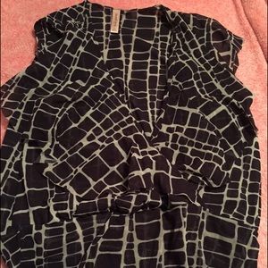 Sweet Pea giraffe print sleeveless top.