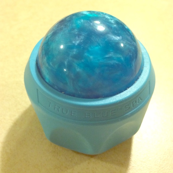 Handheld, self massager roller.