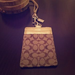 Authentic coach ID holder.