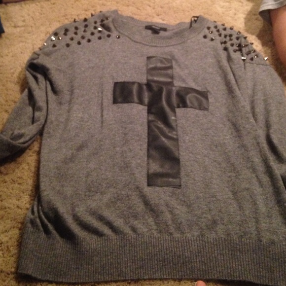 Gray, cotton sweater with studs on shoulder.
