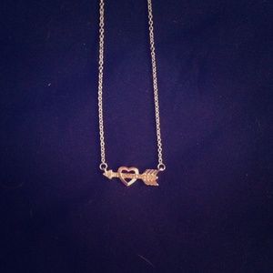 Heart with arrow necklace.