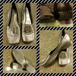 Black Leather slip on flats with slight  heel.